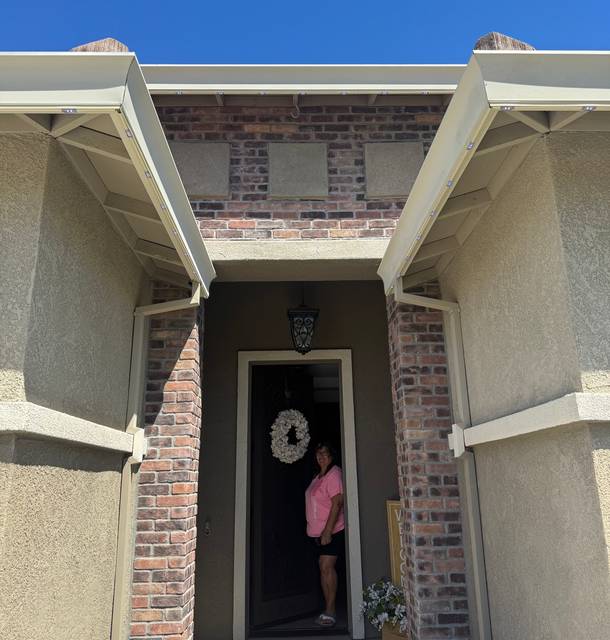 christmas lights installation on a house