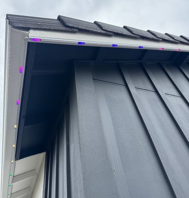 christmas lights installation on a house