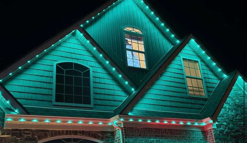 christmas lights installation on a house