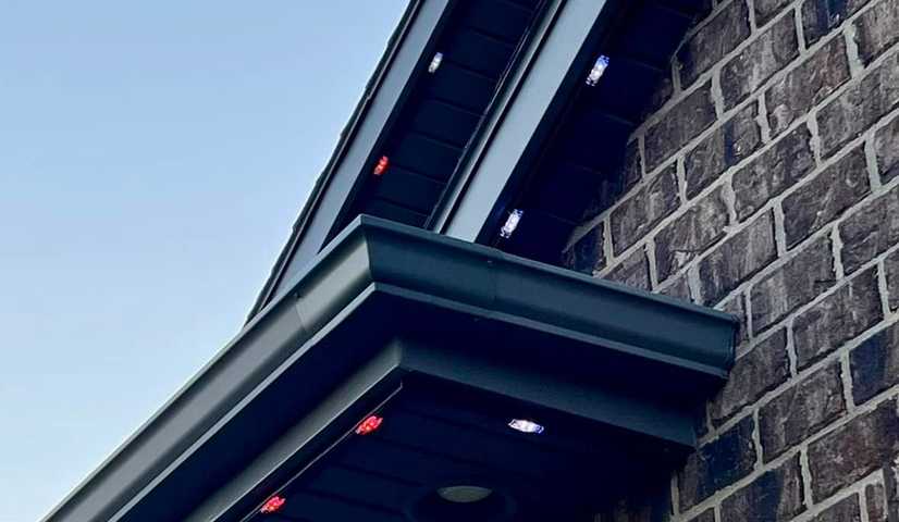 christmas lights installation on a house