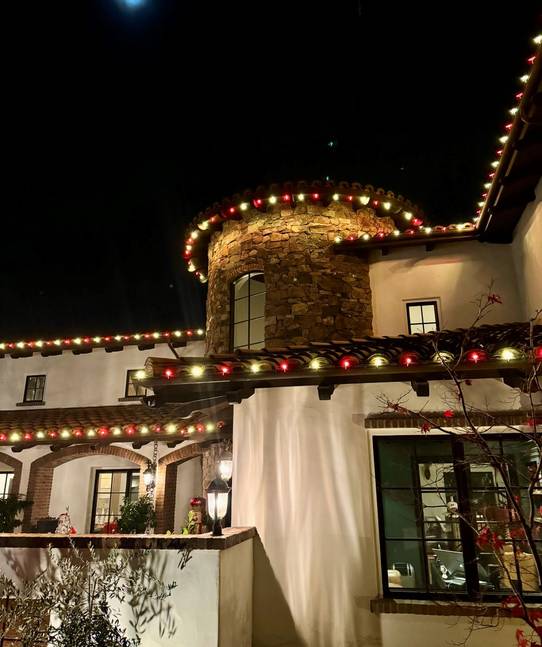 christmas lights installation on a house