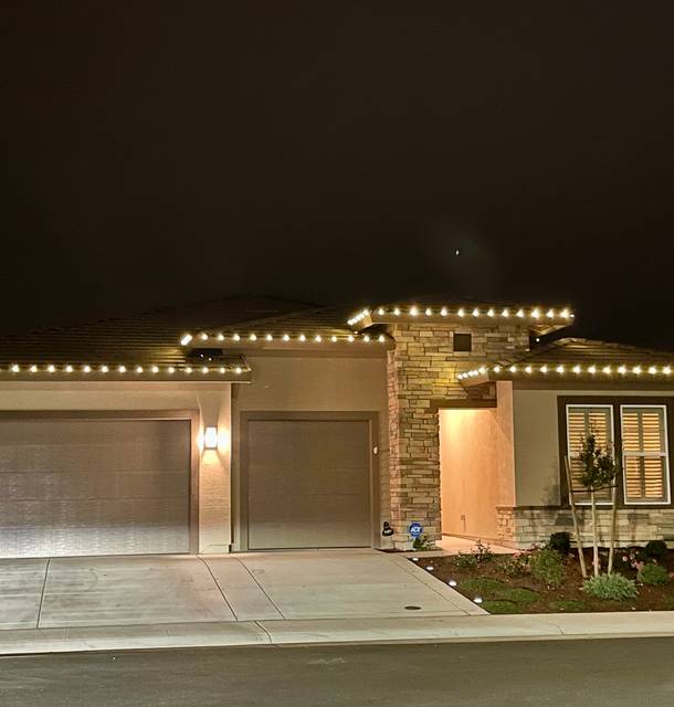 christmas lights installation on a house
