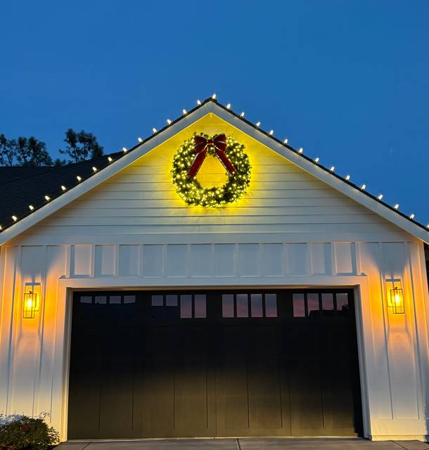 christmas lights installation on a house