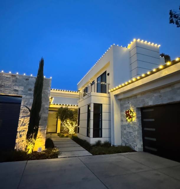 christmas lights installation on a house