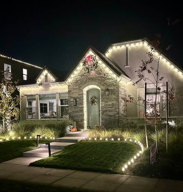 christmas lights installation on a house