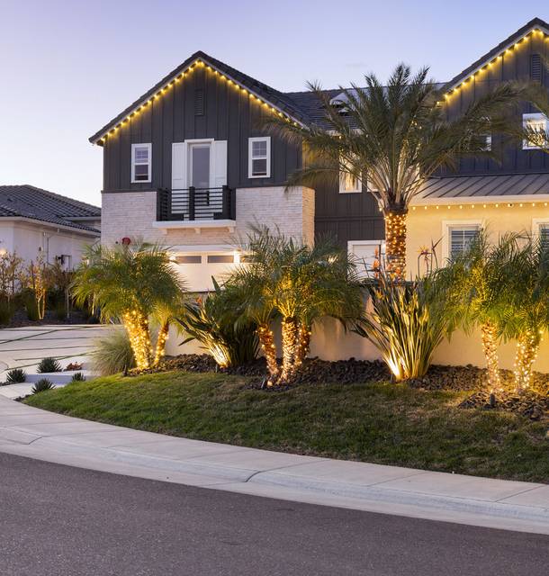 christmas lights installation on a house