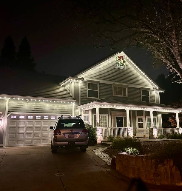 christmas lights installation on a house