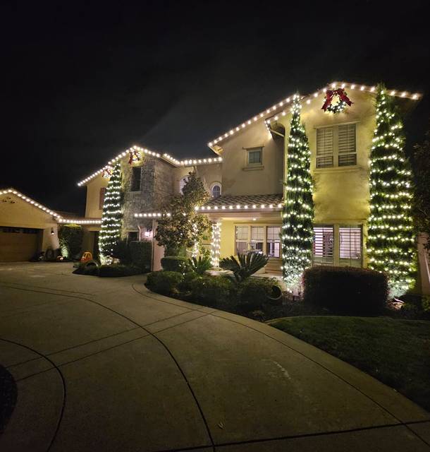 christmas lights installation on a house