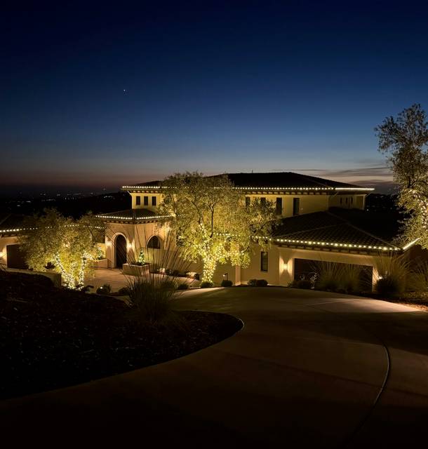 christmas lights installation on a house
