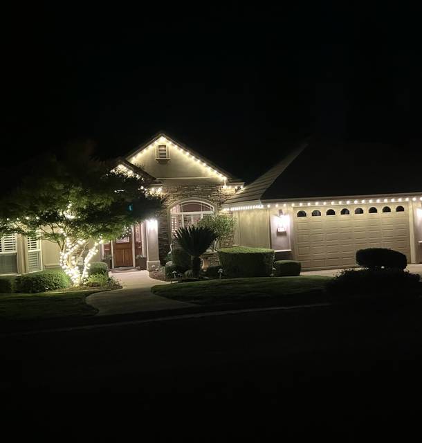 christmas lights installation on a house