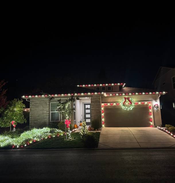 christmas lights installation on a house